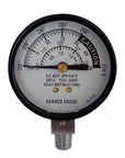 An All American stainless steel geared steam gauge with a dial indicating gauge readings. It has a black and white color scheme with metallic accents.