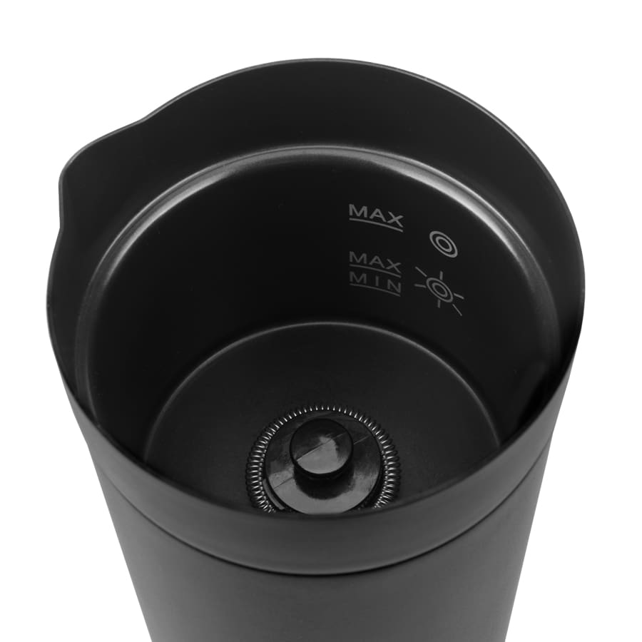 Black milk frother on a white background