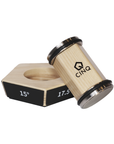 A CINQ brand rolling knife sharpener with a wooden base and metallic grit discs, displayed with a black level indicator.