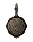 Bottom view of 8 inch FINEX Cast Iron Skillet with no lid displayed on a white background