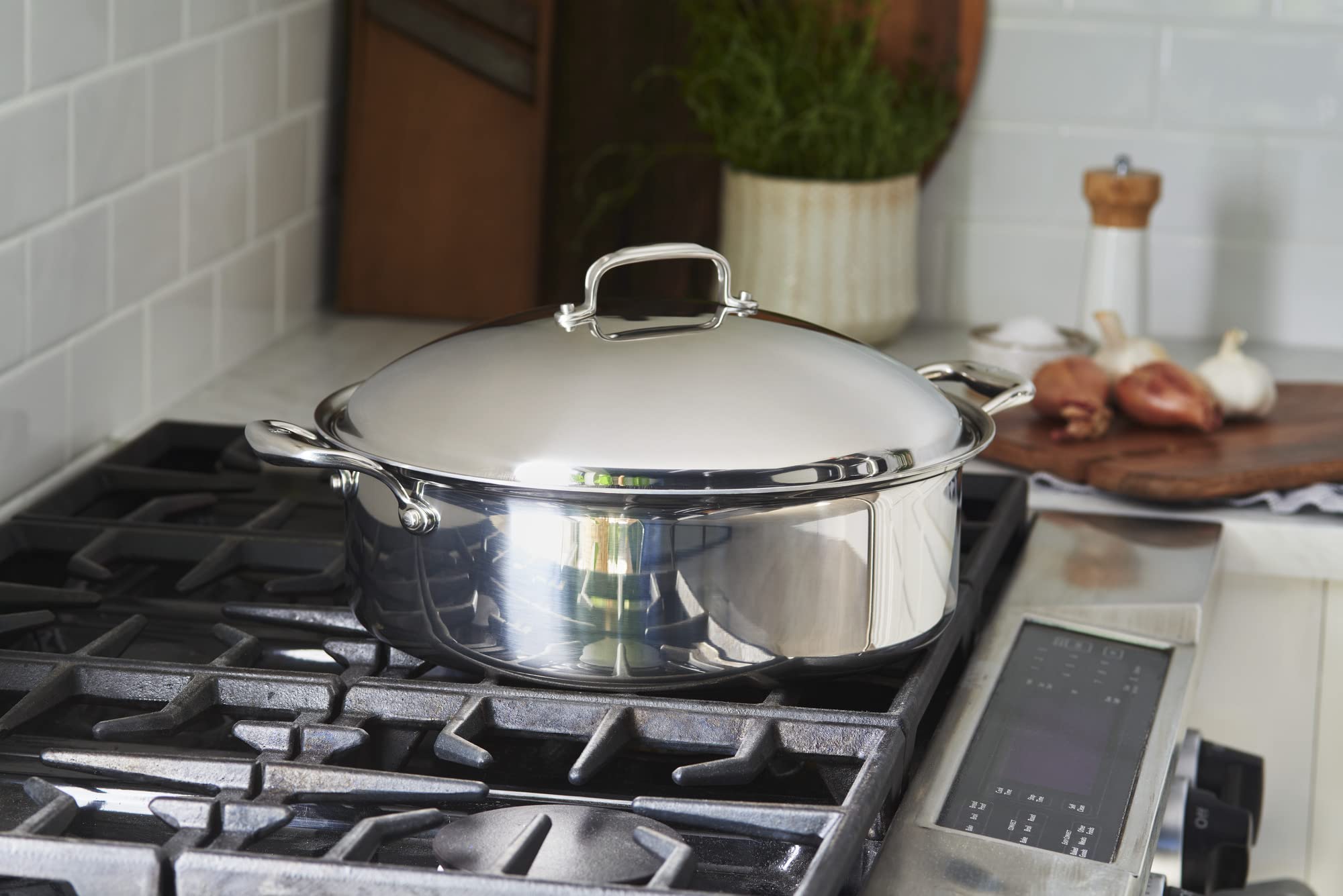 Stainless steel pot on a gas stove in a kitchen setting
