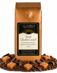1 lb Decaf Chocolate Carmel coffee beans bag with carmel squares, chocolate flakes, and coffee beans in front displayed on a white background
