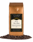 1 lb J.L. Hufford Decaf House Blend coffee bag with coffee beans on a white background