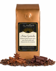 1 lb J.L. Hufford Antigua Guatemalan coffee bag with coffee beans, chocolate shavings and cinnamon sticks in front of the coffee bag
