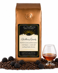 1 lb Blackberry Brandy coffee beans bag with coffee beans, blackberries and glass of brandy in front displayed on a white background