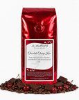 1 lb J.L. Hufford Chocolate Cherry Kiss coffee bag with coffee beans, chocolate bars, and cherries on a white background