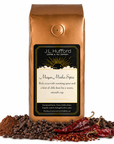 1 lb Mayan Mocha coffee beans bag with coffee beans, coca, chili in front displayed on a white background