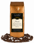 1 lb J.L. Hufford Mounds coffee bag with coffee beans, blocks of chocolate, and flakes of coconut on a white background