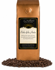 1 lb J.L. Hufford Peaks of the Andes coffee bag with coffee beans on a white background
