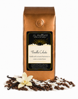 1 lb J.L. Hufford Vanilla Colada coffee bag with coffee beans, vanilla sticks, and coconut shavings on a white background