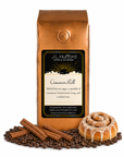 1 lb Cinnamon Roll coffee beans bag with coffee beans, cinnamon sticks, and cinnamon roll in front displayed on a white background
