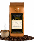 1 lb J.L. Hufford Herman's Signature Blend coffee bag with coffee beans and mug of coffee on a white background