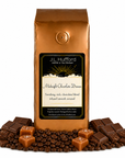 1 lb J.L. Hufford Midnight Chocolate Dream coffee bag with coffee beans, chocolate, and blocks of caramel on a white background