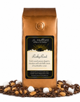 1 lb J.L. Hufford Rocky Road coffee bag with coffee beans, marshmallows, and peanuts covered in melted chocolate on a white background