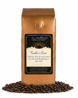 1 lb J.L. Hufford Trucker's Brew coffee bag with coffee beans on a white background