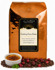 5 lb Cranberry Creme Brulee coffee beans bag with coffee beans, cranberries, and creme brulee in front displayed on a white background