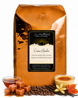 5 lb Creme Brulee coffee beans bag with coffee beans, blocks of caramel, maple syrup, vanilla sticks, and custard in front displayed on a white background