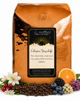 5 lb J.L. Hufford Ethiopian Yirgacheffe coffee bag with coffee beans, florals, and fruits on a white background