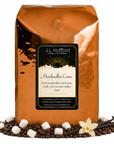 5 lb J.L. Hufford Marshmallow Cream coffee bag with coffee beans, marshmallows, and vanilla sticks on a white background