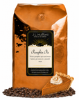 5 lb J.L. Hufford Pumpkin Pie coffee bag with coffee beans and a slice of pumpkin pie on a white background