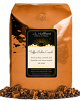 5 lb J.L. Hufford Toffee Praline Crunch coffee bag with coffee beans, praline, and caramel blocks drizzled with chocolate on a white background