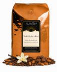 5 lb J.L. Hufford Vanilla Chocolate Almond coffee bag with coffee beans, vanilla sticks, almonds, milk chocolate on a white background