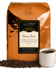 5 lb J.L. Hufford Vienna Roast coffee bag with coffee beans and mug of coffee on a white background