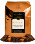 5 lb J.L. Hufford Midnight Chocolate Dream coffee bag with coffee beans, chocolate, and blocks of caramel on a white background