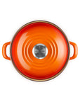 Top view of the flame 3.8 qt enamel on steel traditional petite stockpot with lid and handles on a white background