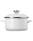 White 3.8 qt enamel on steel traditional petite stockpot with lid and handles on a white background