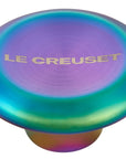 Multicolored kitchen knob with 'Le Creuset' branding on a white background