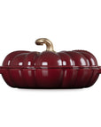 Rhone cast iron pumpkin braiser with handles and a gold knob on a white background