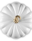 White cast iron signature pumpkin braiser with gold knob on a white background