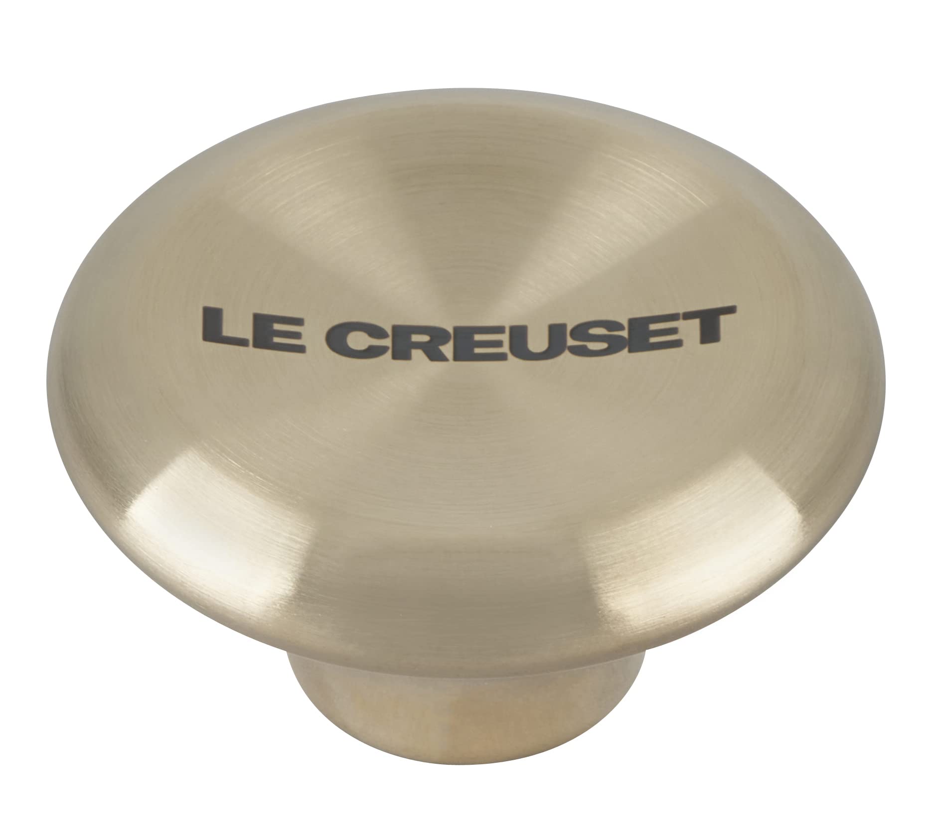 Light gold knob with 'Le Creuset' branding on a white background