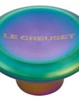 Steel iridescent knob with 'Le Creuset' branding on a white background