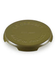 Olive Le Creuset enameled cast iron signature trivet on a white background
