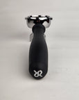 Rancillio portafilter with handle and double spout on a light background
