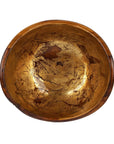 Top view of Rico & Plato adagio teak bowl with distressed copper leaf exterior displayed on a white background