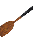 Rico & Plato bistro teak spatula with black handles displayed on a white background
