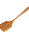 Top view of Rico & Plato emanuel teak spatula with air holes displayed on a white background