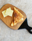 Rico & Plato Pepper Teak Cutting Board/Serving Pepper with Black Handle