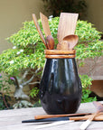 Rico & Plato Sam Black Teak Vase with Copper Leaf Accent