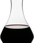 Riedel cabernet decanter with red wine inside on a white background