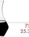Riedel cabernet decanter with red wine inside with volume on a white background