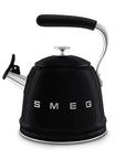 Black SMEG retro style stovetop whistling kettle on a white background