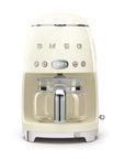 Front view of cream Smeg coffee machine on a white background