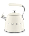 Cream SMEG retro style stovetop whistling kettle on a white background