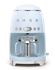 Front view of pastel blue Smeg coffee machine on a white background