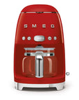 Front view of red Smeg coffee machine on a white background