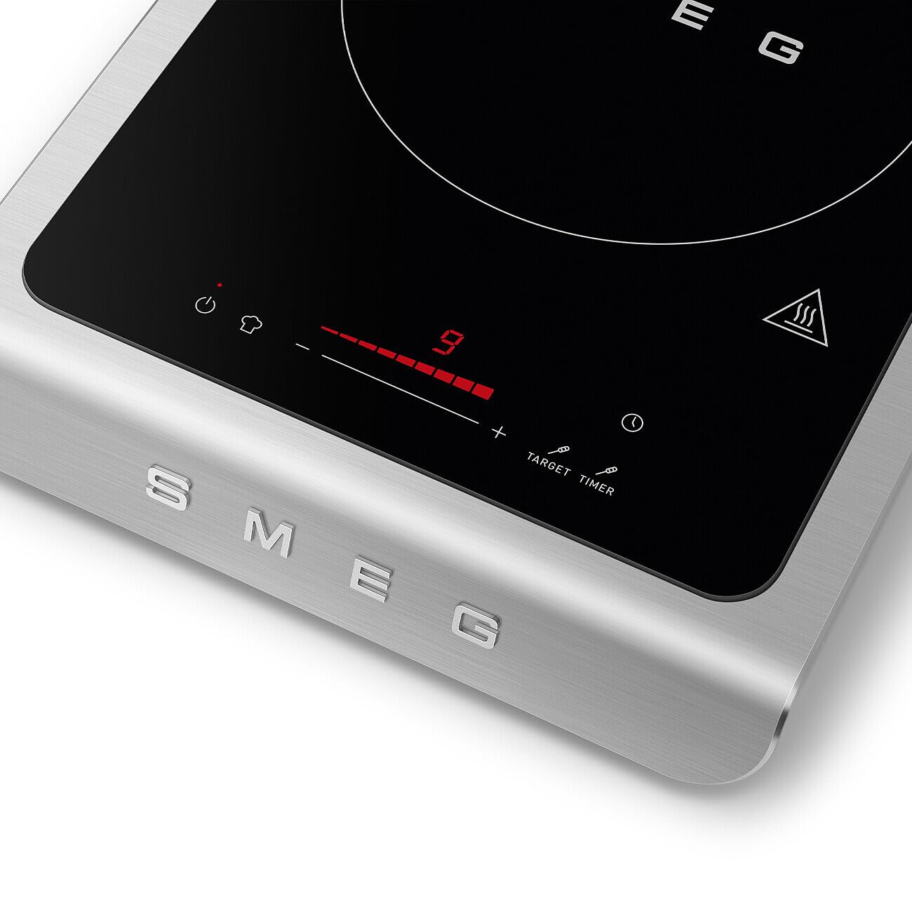 Induction cooktop with digital display and SMEG branding on a white background